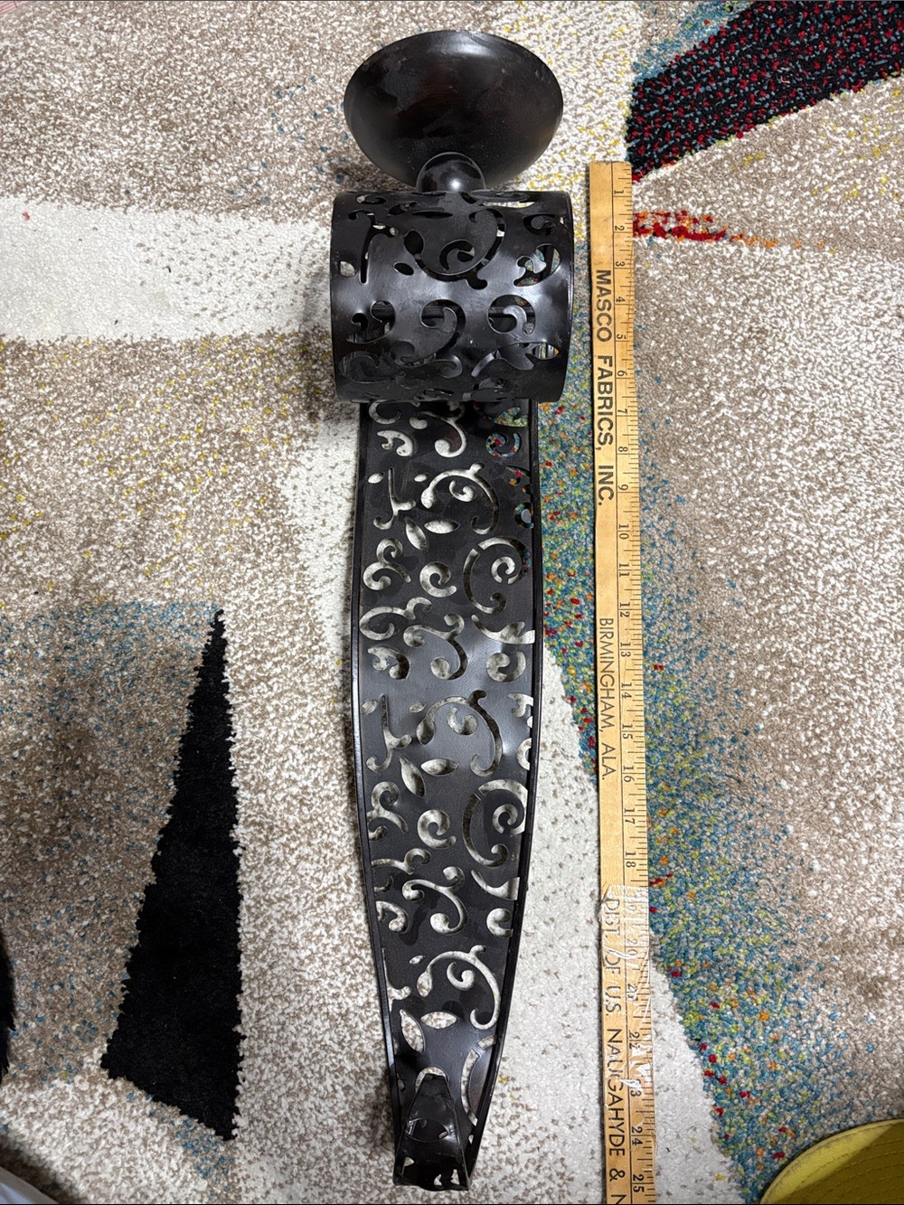 One Pier One Black Metal Scroll Wall Sconce.